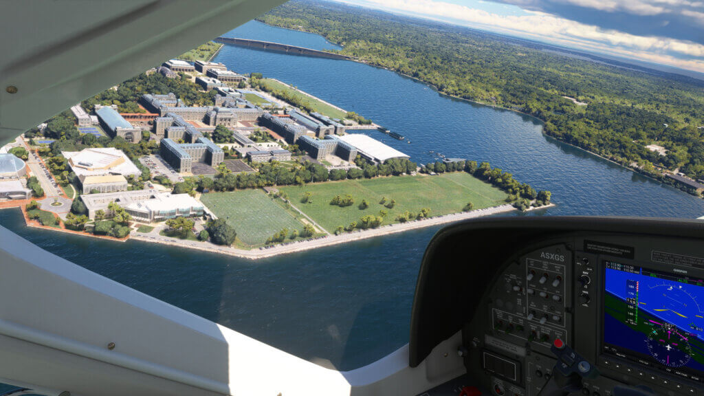 Flying over a river looking outside the window of a plane