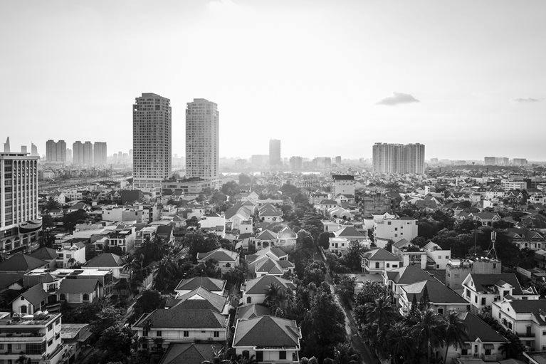 A view over District 2 and beyond, Ho Chi Minh City, Vietnam. - stock photo