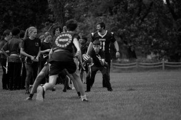 Sports Leaders Programme participants from Greyfriars school learning American Football with University of Oxford student athletes