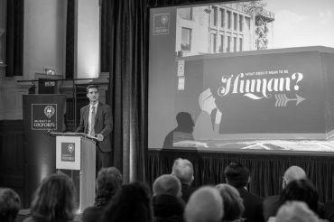 Image of Reverend Canon Professor Luke Bretherton, Regius Professor of Moral and Pastoral Theology at the University of Oxford, delivering his talk at the Sheldonian Series: Life event